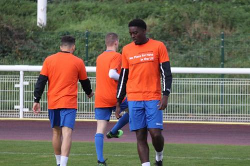 IMG 6066-Enfields-Jerry-Gyebi-wearing-a-warm-up-top-in-support-of-National-hate-crime-awareness-week