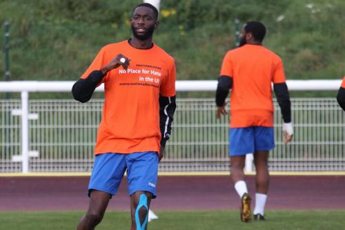 IMG 6069-Enfields-Muhammadu-Faal-wearing-a-warm-up-top-in-support-of-National-hate-crime-awareness-week