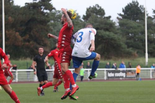 IMG 6139-Worthings-Reece-Myles-Meekums-red-challenges-Ryan-Kirwan