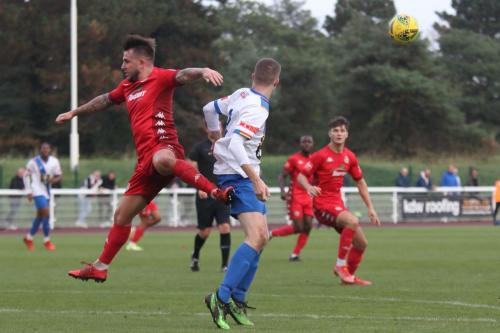 IMG 6141-Worthings-Reece-Myles-Meekums-red-challenges-Ryan-Kirwan