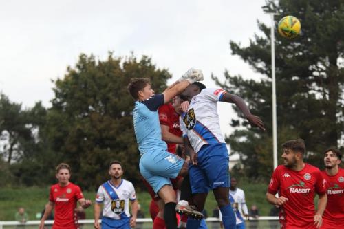 IMG 6148-Worthing-keeper-Harrison-Male-punches-clear-from-Jerry-Gyebi