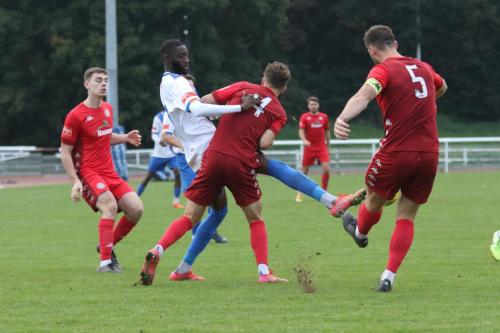 IMG 6208-Worthings-Aarran-Racine-5-clears-the-danger-as-Will-Seager-holds-off-Muhammadu-Faal