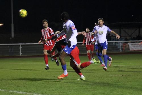 IMG 0754-Alex-Bentley-heads-clear-from-Enfields-Andre-Coker