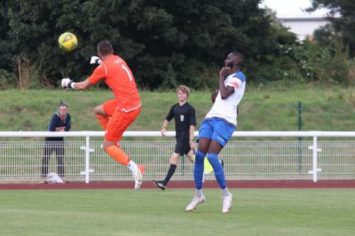 IMG 3084-Grays-keeper-Donny-Sambridge-heads-clear-from-Muhammadu-Faal