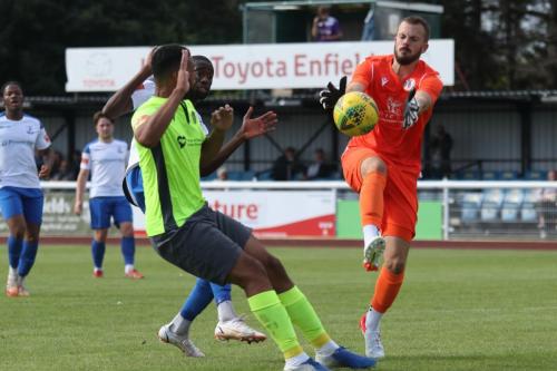 IMG 3121-Grays-keeper-Donny-Sambridge-collects-the-ball-ahead-of-Lance-Akins-green-and-Muhammadu-Faal