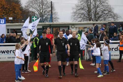 IMG 7716-The-teams-enter-the-field-through-a-guard-of-honour-provided-by-Enfield-Town-Ladies-FC