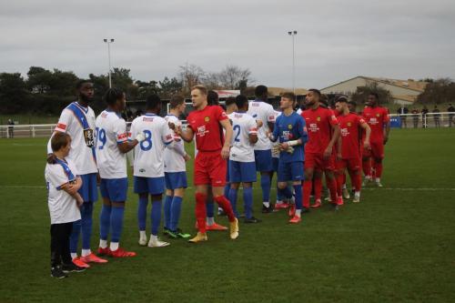 IMG 7723-Merstham-captain-James-Richmond-leads-the-pre-match-formalities