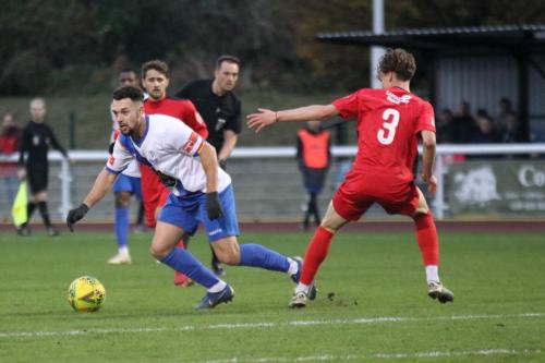 IMG 7863-Enfields-Lyle-Della-Verde-spins-away-from-Jude-Mason