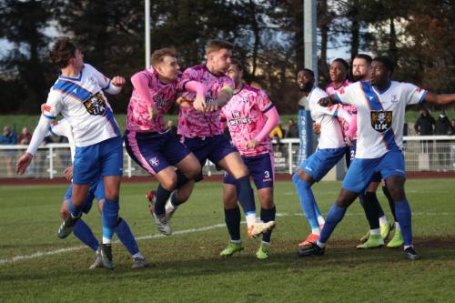 IMG 1390-Sam-Youngs-L-sends-a-header-across-goal