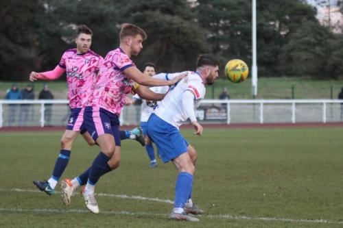 IMG 1612-Jake-Cass-shields-the-ball-from-Ben-Swift