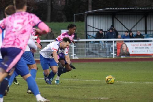 IMG 1661-Martial-Godo-brings-down-Lyle-Della-Verde-to-concede-the-penalty-that-allowed-Muhammadu-Faal-to-score-the-fourth-goal-and-his-third.