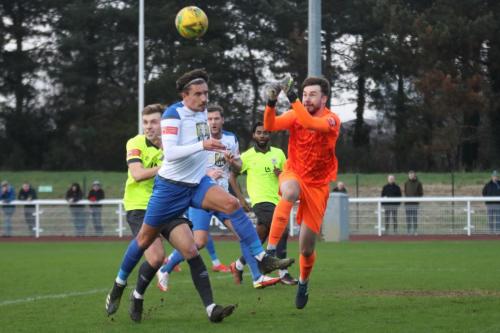 IMG 8994-Potters-Bar-keeper-Ciaran-Gordon-Stearn-knocks-the-ball-away-from-Sam-Youngs