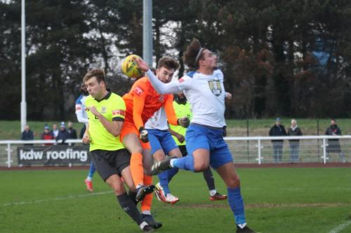 IMG 8996-Potters-Bar-keeper-Ciaran-Gordon-Stearn-knocks-the-ball-away-from-Sam-Youngs