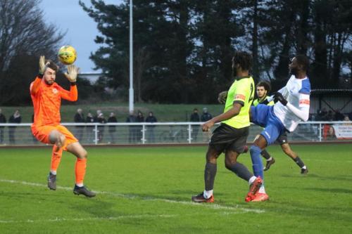 IMG 9102-Muhammadu-Faal-lifts-the-ball-over-Ciaran-Gordon-Stearn-for-the-opening-goal