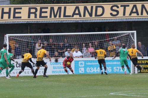 Enfield's Nathan McDonald deals comfortably with a free kick