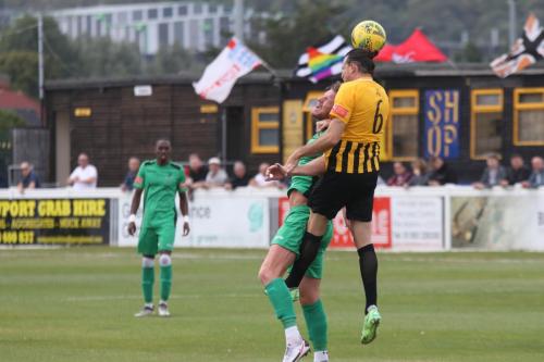 Folkestone's Ryan Johnson (R) and Enfield's Adam Cunnington