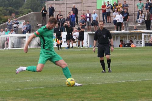 Adam Cunnington hits the post