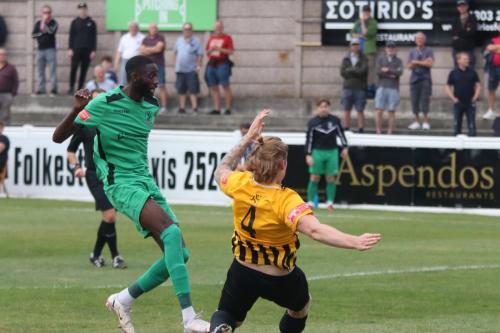 Muhammadu Faal shoots just wide as Finn O'Mara tries to block