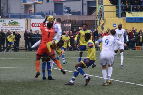 IMG 0499-Lamar-Joseph-Johnson-holds-onto-the-ball-despite-colliding-with-teammate-Jorge-Djassi-Sambu-and-Enfields-Rian-Bray