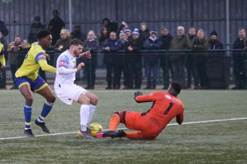 IMG 0610-Lamar-Joseph-Johnson-brings-down-Jake-Cass-to-concede-a-penalty-which-he-then-saved