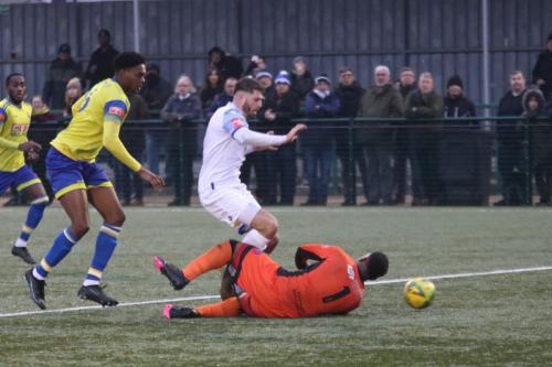IMG 0611-Lamar-Joseph-Johnson-brings-down-Jake-Cass-to-concede-a-penalty-which-he-then-saved
