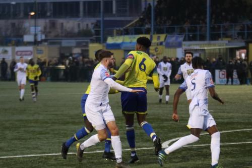 IMG 0645-Tyrese-Owen-heads-clear-from-Nathan-Smith-5-and-Jake-Cass