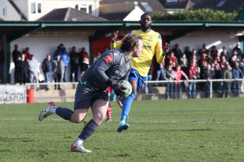 IMG 3771-Joe-Wright-collects-the-ball-ahead-of-Muhammadu-Faal