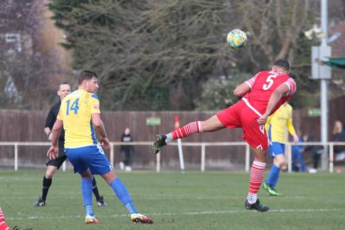 IMG 3907-Nathan-Bertram-Cooper-heads-clear-from-Adam-Cunnington