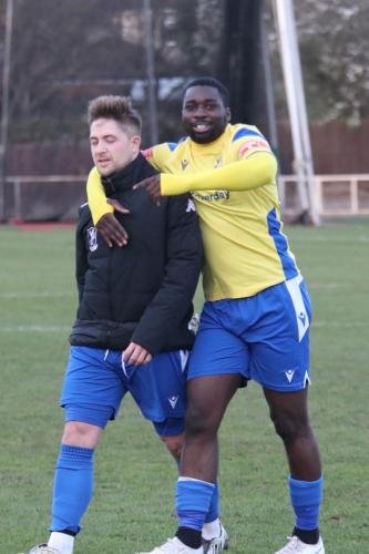 IMG 4070-Sub-Percy-Kiangebeni-celbrates-with-Lewis-Taaffe-the-player-he-replaced