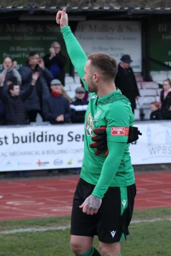 IMG 4078-Nathan-McDonald-acknowledges-the-Enfield-supporters