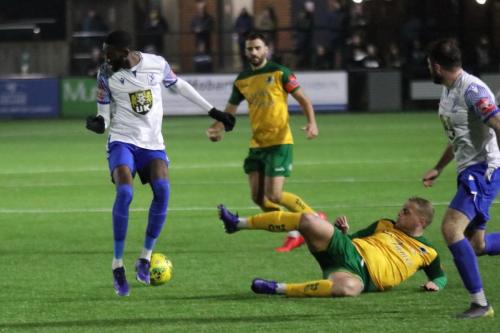 IMG 0247-Tom-Day-slides-the-ball-away-from-Muhammadu-Faal