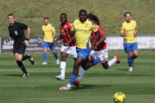 IMG 4142-Enfields-Percy-Kiangebeni-yellow-chased-by-Bradley-Pritchard