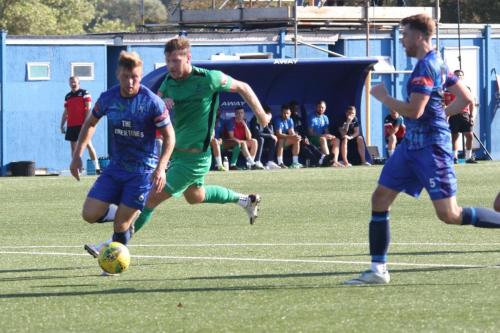 IMG 4818-Margates-Ben-Swift-clears-from-Adam-Cunnington-green