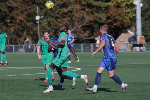 IMG 4834-Enfields-Muhammadu-Faal-keeps-his-eye-on-the-ball-while-Ben-Swift-keeps-his-eye-on-Faal