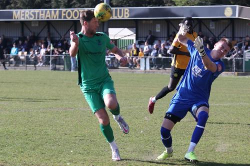IMG 4858-Merstham-keeper-Patrick-Ohman-saves-a-close-range-shot-from-Adam-Cunnington
