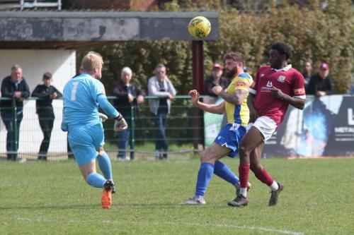 IMG 6269-Potters-Bar-keeper-Kacper-Kurylowicz-clears-from-Jake-Cass-and-Jacques-Kpohomouh-R