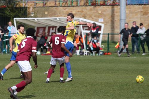 IMG 6344-Enfields-Adam-Cunnington-heads-the-ball-forward