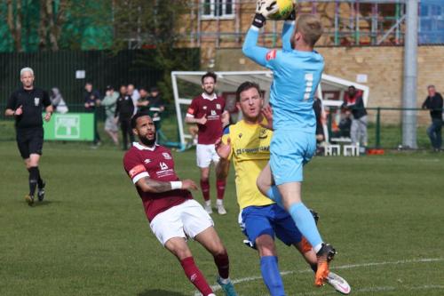 IMG 6387-Kacper-Kurylowicz-catches-a-cross-ahead-of-Frazer-Shaw-L-and-Adam-Cunnington