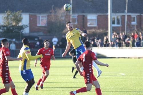 IMG 3141-Adam-Cunnington-heads-the-ball-forward