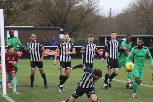 IMG 8266-Hanwells-George-Nicholas-stoops-to-head-clear