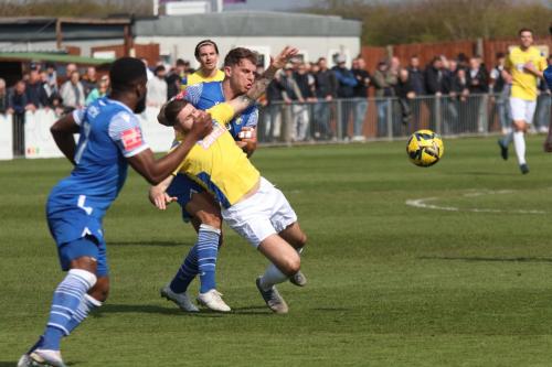 IMG 9058-Stortfords-Ryan-Henshaw-clears-from-Jake-Cass