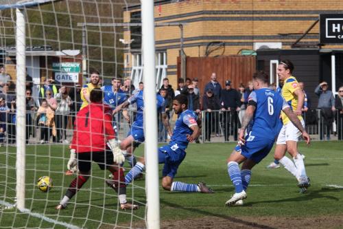 IMG 9116-Stortfords-Ryan-Charles-puts-the-ball-out-for-a-corner