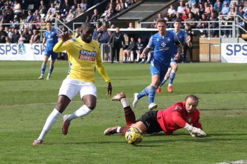 IMG 9139-Michael-Bakare-takes-the-ball-round-Jack-Giddens-before-scoring