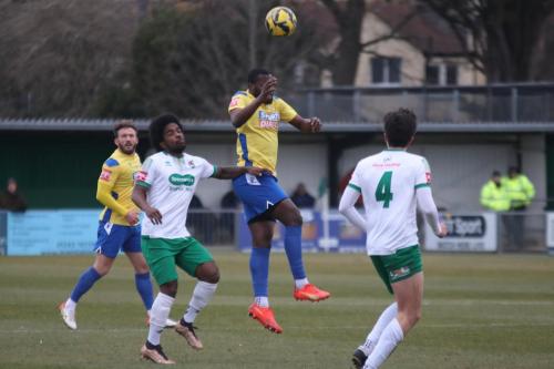 IMG 5737-Enfield-debutant-Mo-Kamara-wins-a-header-against-Walter-Figueira