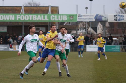 IMG 5867-Adam-Cunnington-forces-his-way-past-Craig-Robson-L-and-Cameron-Black