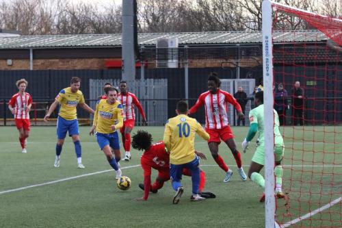 IMG 3052-Bowers-Dexter-Peter-clears-but-only-as-far-as-James-Richmond-out-of-frame-who-scores-the-fourth-Enfield-goal