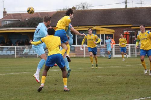 IMG 4951-Adam-Cunnington-challenges-Sam-Mvemba-foreground-and-Elliot-Johnson
