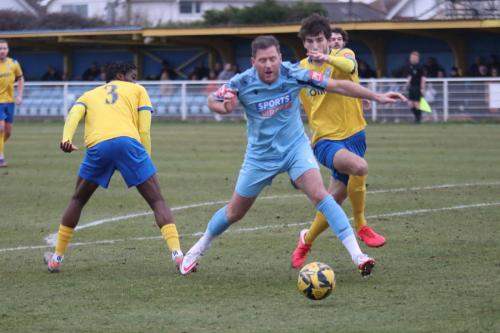 IMG 4971-Adam-Cunnington-tries-to-squeeze-between-Sam-Mvemba-L-and-Elliot-Johnson