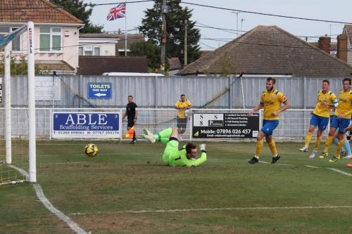 IMG 7578-Canveys-Rhys-Byrne-tips-a-shot-from-Marcus-Wyllie-past-the-post