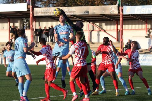 IMG 0893-Carshalton-keeper-Danny-Bracken-knocks-the-ball-away-from-Anthony-Wordsworth